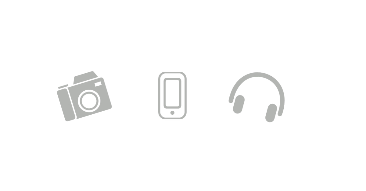 A grey camera, grey phone, and grey headphones over a white background. 